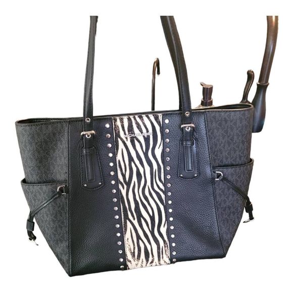 Michael Kors Handbags - Michael Kors Voyager Zebra Print East West Signature Tote Black/Silver Hardware